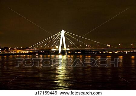 Stock Photograph - Rhine, Germany; Suspension bridge across the river Rhine. Fotosearch