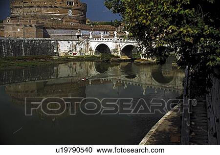 Rome, Italy; Lone kayaker on a river beside an ancient castle View Large Photo Image Stock Image - Rome, Italy; Lone kayaker on a river beside an ancient castle. Fotosearch