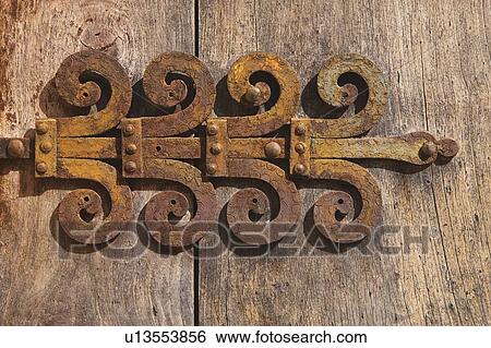 Ronda, Malaga Proving, Spain; old decorative hinge on door View Large Photo Image Stock Photograph - Ronda, Malaga Proving, Spain; old decorative hinge on door. Fotosearch