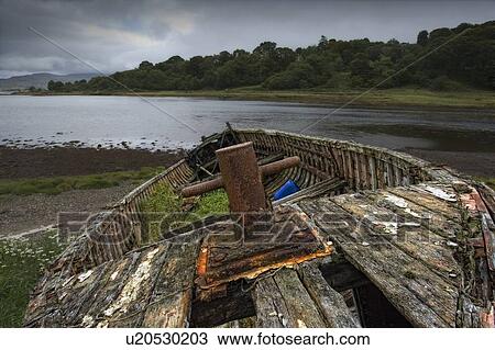 Scotland; Old, weathered boat on shore View Large Photo Image Stock Image - Scotland; Old, weathered boat on shore. Fotosearch