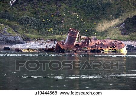 Stock Photo - Scotland; View of rusty shipwreck . Fotosearch