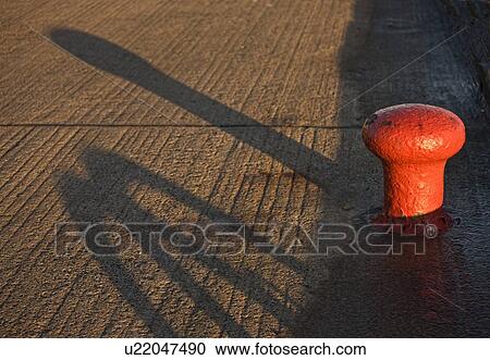 Stock Image - Seahouses, Northumberland, England; Mooring bollard. Fotosearch