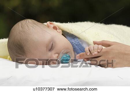 Sleeping baby View Large Photo Image Stock Photo - Sleeping baby. Fotosearch
