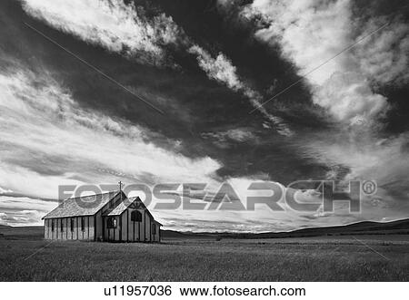 Small country church in grass field in black and white View Large Photo Image Stock Photograph - Small country church in grass field in black and white. Fotosearch