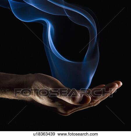 Smoke wisps from a hand View Large Photo Image Stock Photo - Smoke wisps from a hand. Fotosearch