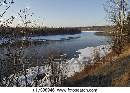 Stock Photograph - Spring thaw, Fraser River, Prince George, British Columbia. Fotosearch