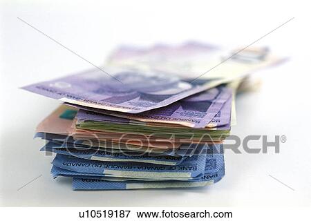 Stack of Canadian money View Large Photo Image Stock Photo - Stack of Canadian money. Fotosearch