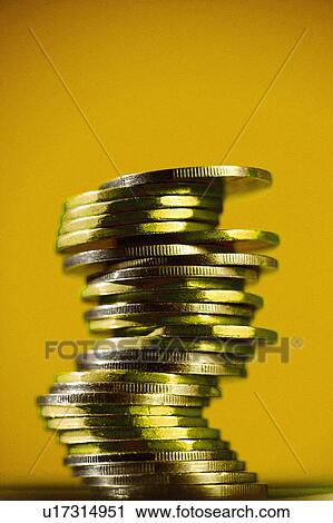 Stock Image - Stacked loonies. Fotosearch