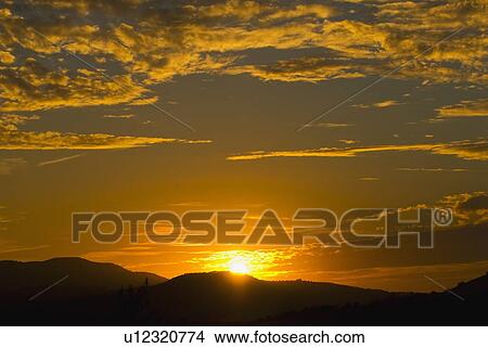 Sunset over landscape View Large Photo Image Picture - Sunset over landscape. Fotosearch