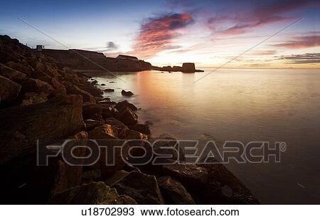 Sunset shores View Large Photo Image Stock Image - Sunset shores. Fotosearch