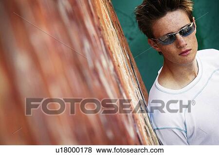 Teenage boy with a model's attitude View Large Photo Image Stock Photo - Teenage boy with a model's attitude. Fotosearch