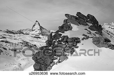 The Matterhorn towers, Swiss ski resort, Zermatt, Valais, Switzerland View Large Photo Image Stock Photograph - The Matterhorn towers, Swiss ski resort, Zermatt, Valais, Switzerland. Fotosearch
