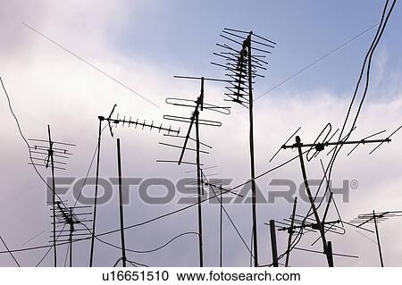 TV aerials; TV aerials against the sky View Large Photo Image Stock Image - TV aerials; TV aerials against the sky. Fotosearch
