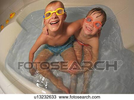 Stock Image - Two children in bathtub. Fotosearch