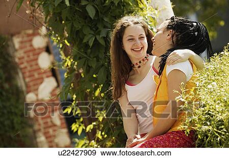 Stock Photo - Two teenage girls. Fotosearch