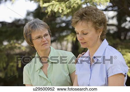 Two women View Large Photo Image Stock Image - Two women. Fotosearch