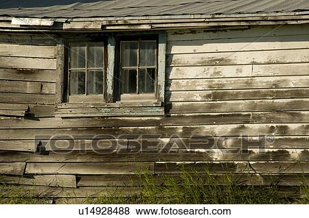 Window on side of old building View Large Photo Image Stock Photo - Window on side of old building. Fotosearch