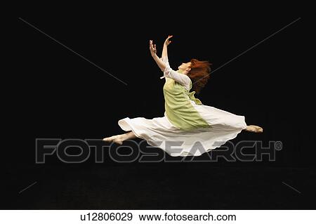 Stock Photo - Woman dancing. Fotosearch