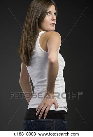 Stock Image - Woman in tank top. Fotosearch
