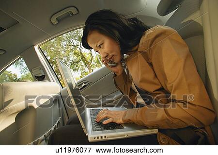 Woman on cell phone View Large Photo Image Stock Photo - Woman on cell phone. Fotosearch