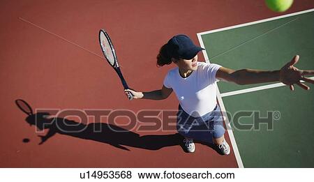 Woman playing tennis View Large Photo Image Stock Photo - Woman playing tennis. Fotosearch