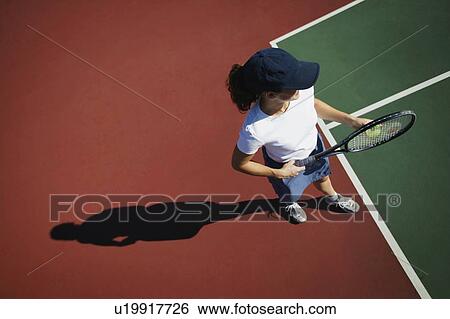 Woman plays tennis View Large Photo Image Stock Photograph - Woman plays tennis. Fotosearch