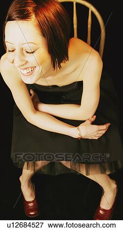 Stock Photo - Woman wearing evening dress. Fotosearch