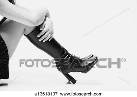 Woman with boots View Large Photo Image Stock Photo - Woman with boots. Fotosearch