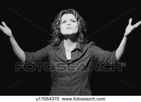 Stock Image - Woman worshipping. Fotosearch