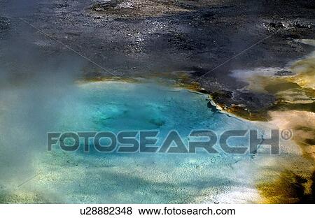 Stock Photo - Wyoming, USA; Hot pool in Yellowstone National Park. Fotosearch