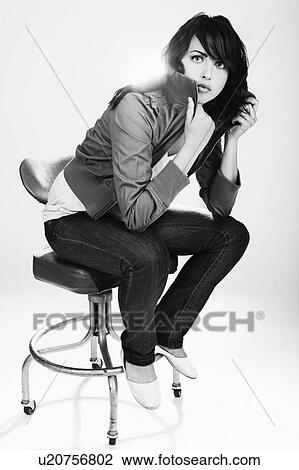 Stock Image - Young woman in jeans. Fotosearch