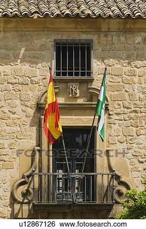 Stock Photograph - Úbeda, Andalucia, Spain; Public Building flying the Spanish and Andalucian Flags. Fotosearch
