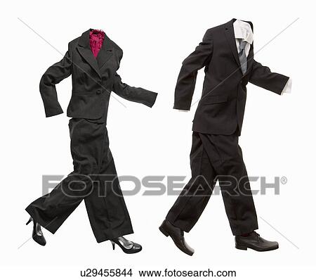 A couple of business suits walking View Large Photo Image Picture - A couple of business suits walking. Fotosearch