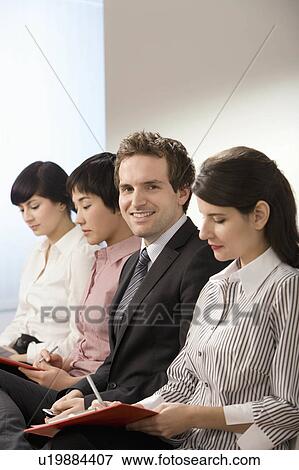 Stock Photo - A male applying for a job. Fotosearch