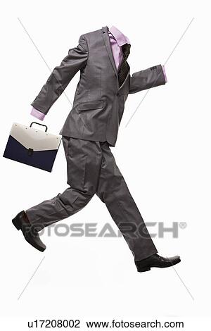 A male suit with briefcase, running View Large Photo Image Stock Image - A male suit with briefcase, running. Fotosearch