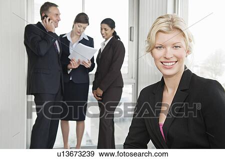 A portrait of a business woman smiling View Large Photo Image Stock Photo - A portrait of a business woman smiling. Fotosearch