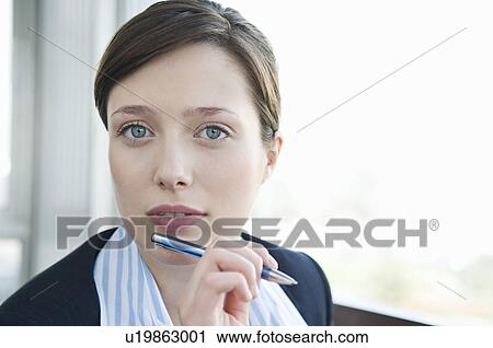 Stock Image - A portrait of a business woman. Fotosearch