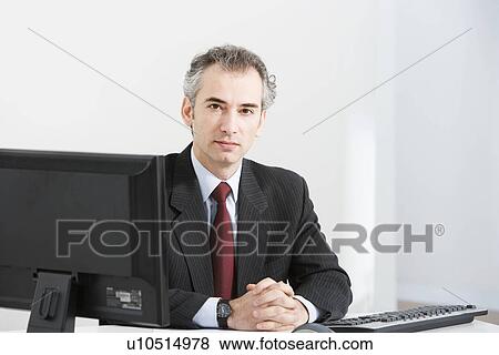 A portrait of a latin business manager View Large Photo Image Stock Photo - A portrait of a latin business manager. Fotosearch