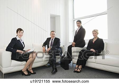 Stock Photography - A portrait of four business people. Fotosearch