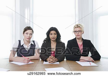 Stock Image - A portrait of three businesswomen. Fotosearch