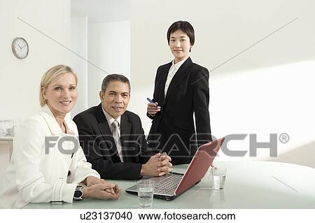 A portrait of three colleagues View Large Photo Image Stock Image - A portrait of three colleagues. Fotosearch