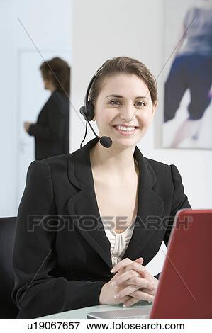 A portrait of young office female View Large Photo Image Stock Photo - A portrait of young office female. Fotosearch