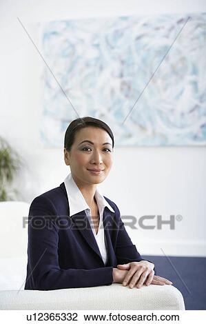 Stock Image - A senior asian businesswoman. Fotosearch