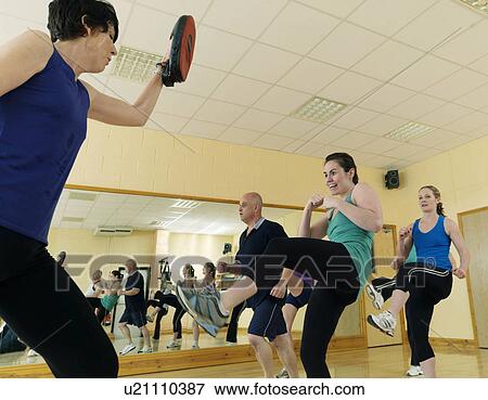 aerobic kick exercise at gym View Large Photo Image Stock Photo - aerobic kick exercise at gym. Fotosearch