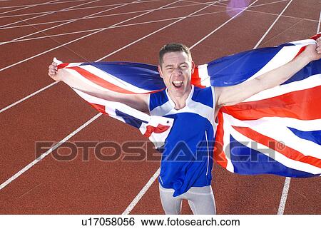 Stock Photograph - athlete holding flag. Fotosearch