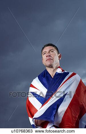 athlete wrapped in U. K. flag View Large Photo Image Stock Image - athlete wrapped in U. K. flag. Fotosearch
