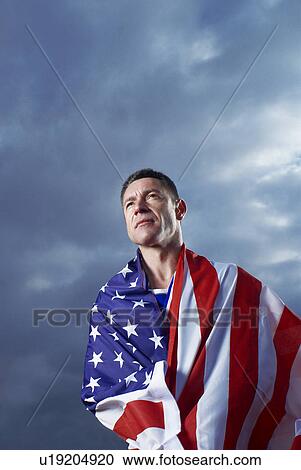 athlete wrapped in U. S. A flag View Large Photo Image Stock Image - athlete wrapped in U. S. A flag. Fotosearch