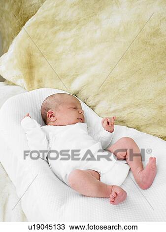 Baby in bed View Large Photo Image Stock Image - Baby in bed. Fotosearch