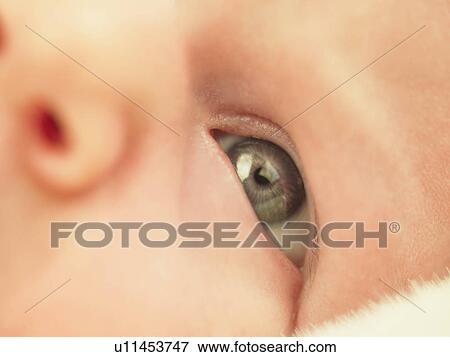Stock Photo - Baby's eye in close up. Fotosearch