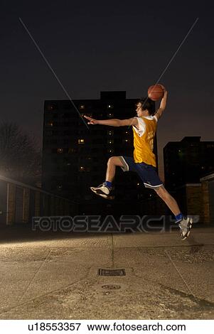basketball player jumping View Large Photo Image Stock Photo - basketball player jumping. Fotosearch
